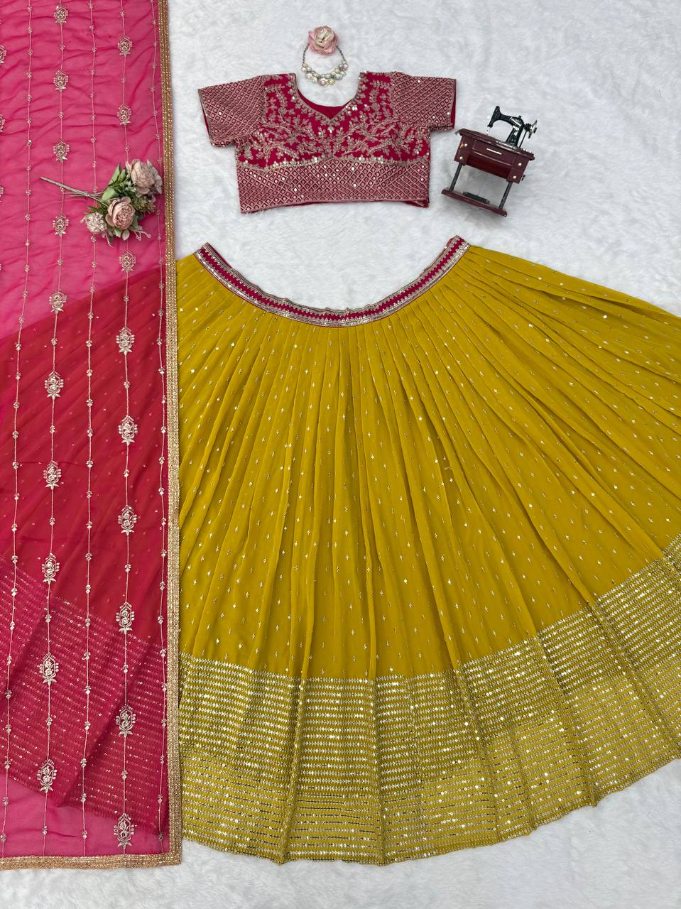 Vibrant Sunshine Yellow and Fuchsia Pink Designer Lehenga Choli with Dazzling Shimmer Embellishments